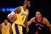 詹姆斯能否出战背靠背？ESPN明日胜率预测：湖人51.3% 猛龙48.7%